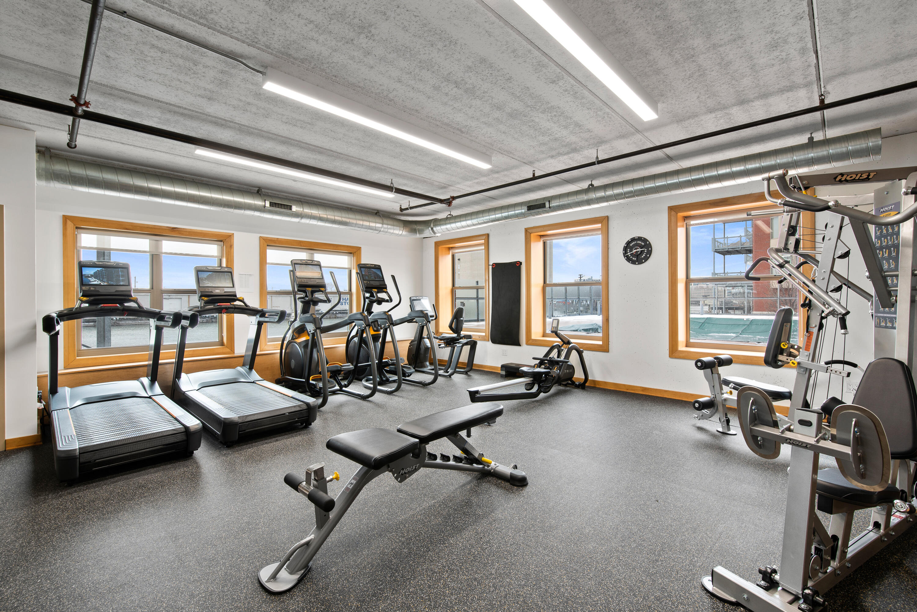601 East Erie Street, Unit 313 Milwaukee, WI 53202 - Photo 38 of 48 Updated River Facing Fitness Room