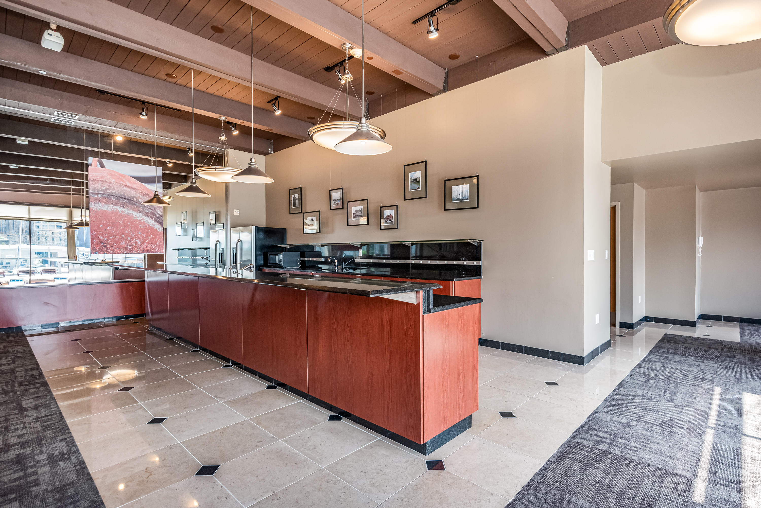 601 East Erie Street, Unit 313 Milwaukee, WI 53202 - Photo 39 of 48 Community Room Catering Kitchen