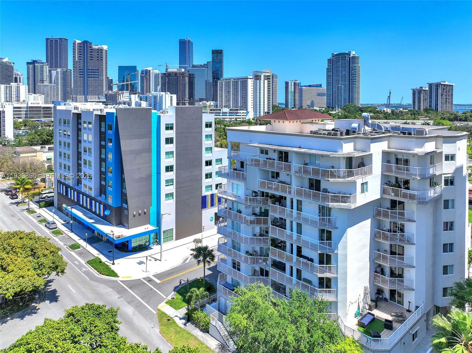 280 Southwest 20th Road, Unit 904 Miami, FL 33129 - Photo 29 of 36 a city view with tall buildings