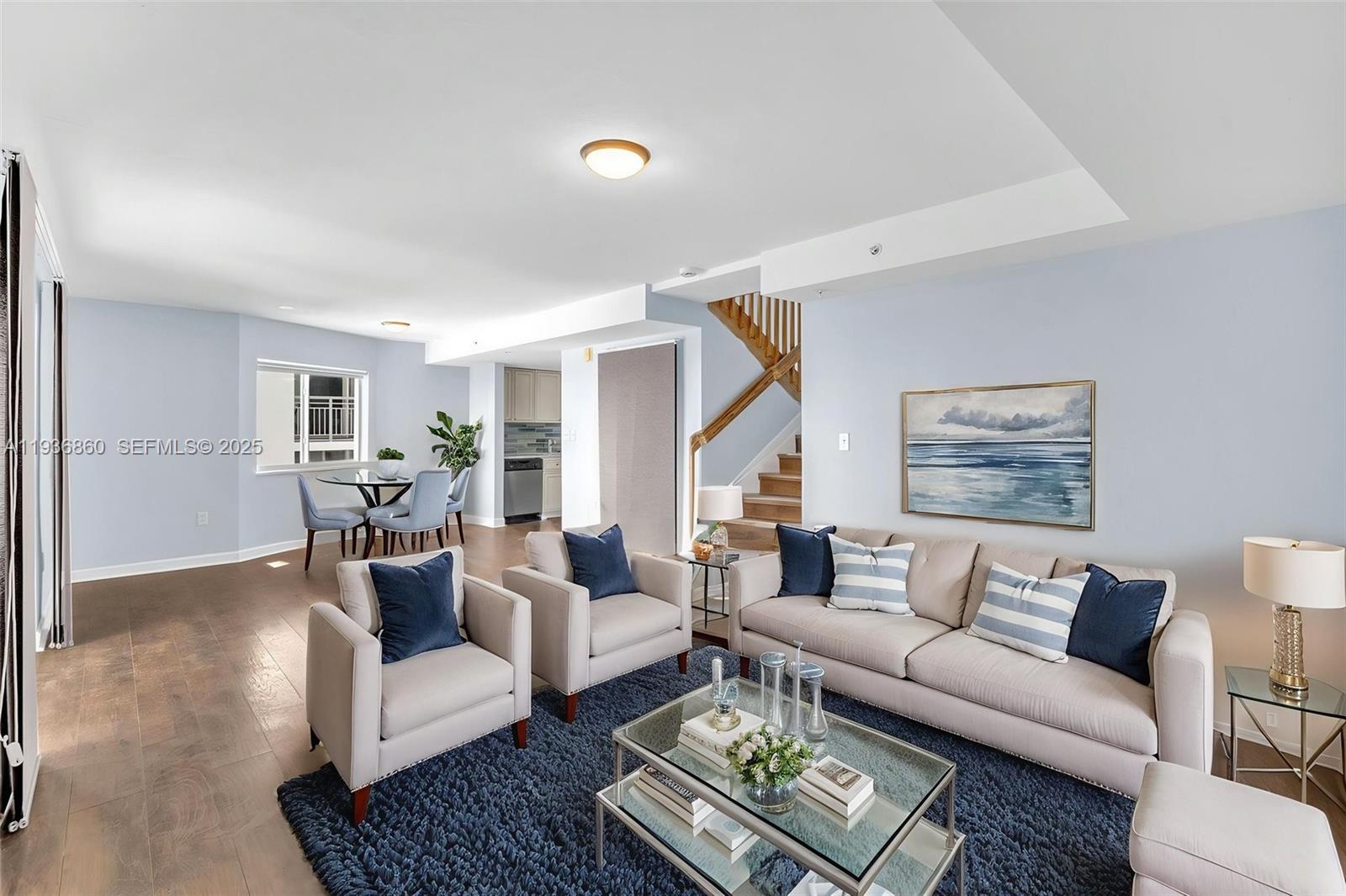 280 Southwest 20th Road, Unit 904 Miami, FL 33129 - Photo 9 of 36 a living room with furniture and a rug