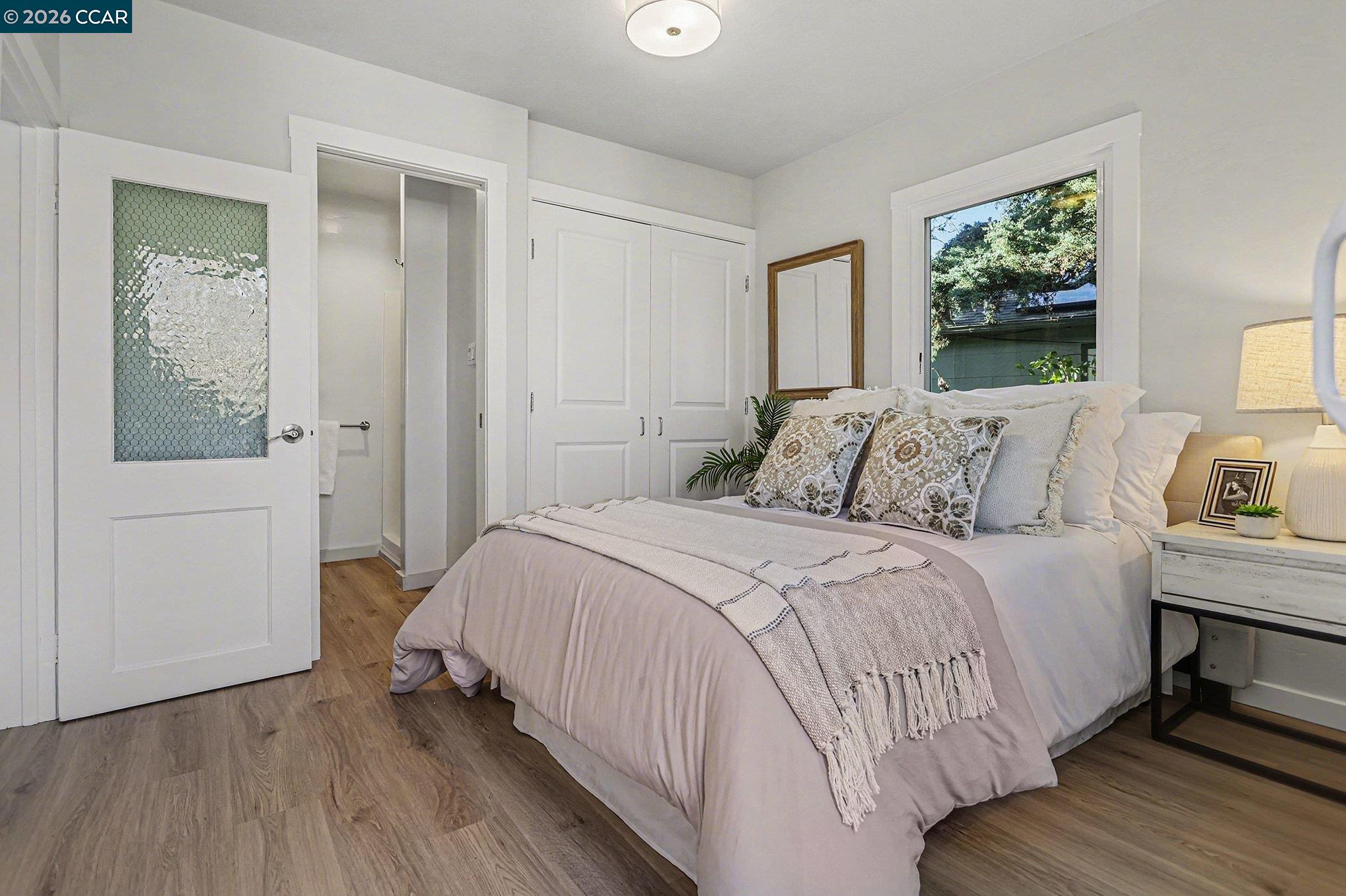 691 Rincon Road El Sobrante, CA 94803 - Photo 17 of 30 a bedroom with a bed and a window