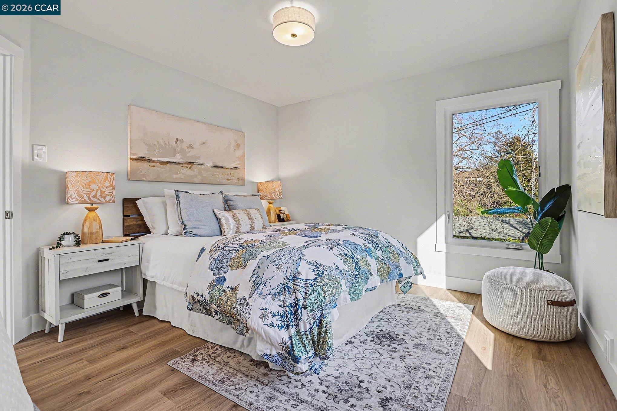 691 Rincon Road El Sobrante, CA 94803 - Photo 20 of 30 a bedroom with a bed and a couch