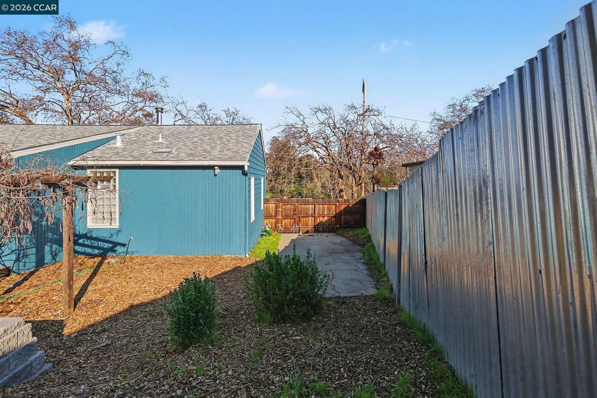 691 Rincon Road El Sobrante, CA 94803 - Photo 27 of 30 a view of a backyard with pathway