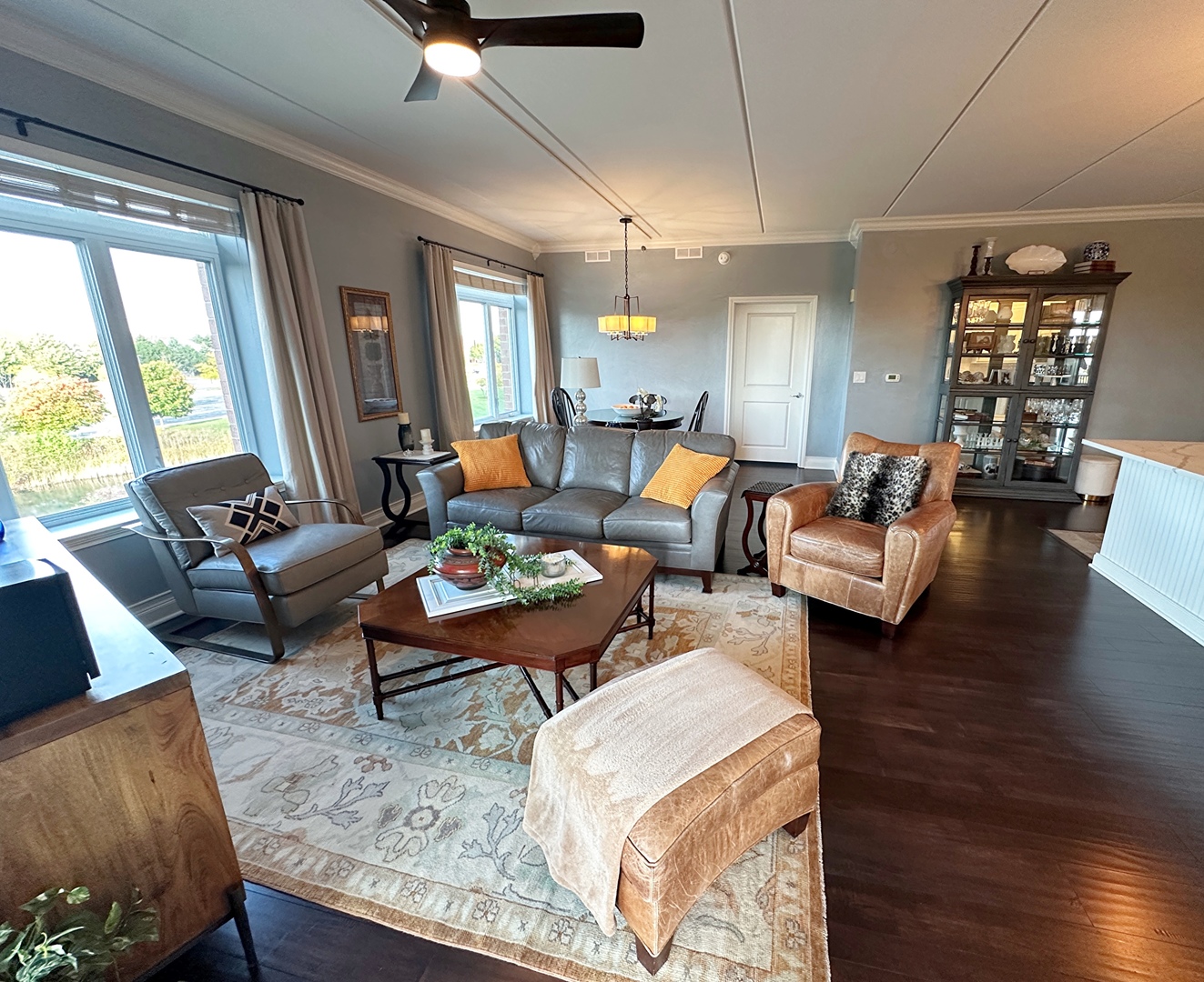 1199 East Port Clinton Road, Unit 304 Vernon Hills, IL 60061 - Photo 11 of 29 a living room with furniture and wooden floor