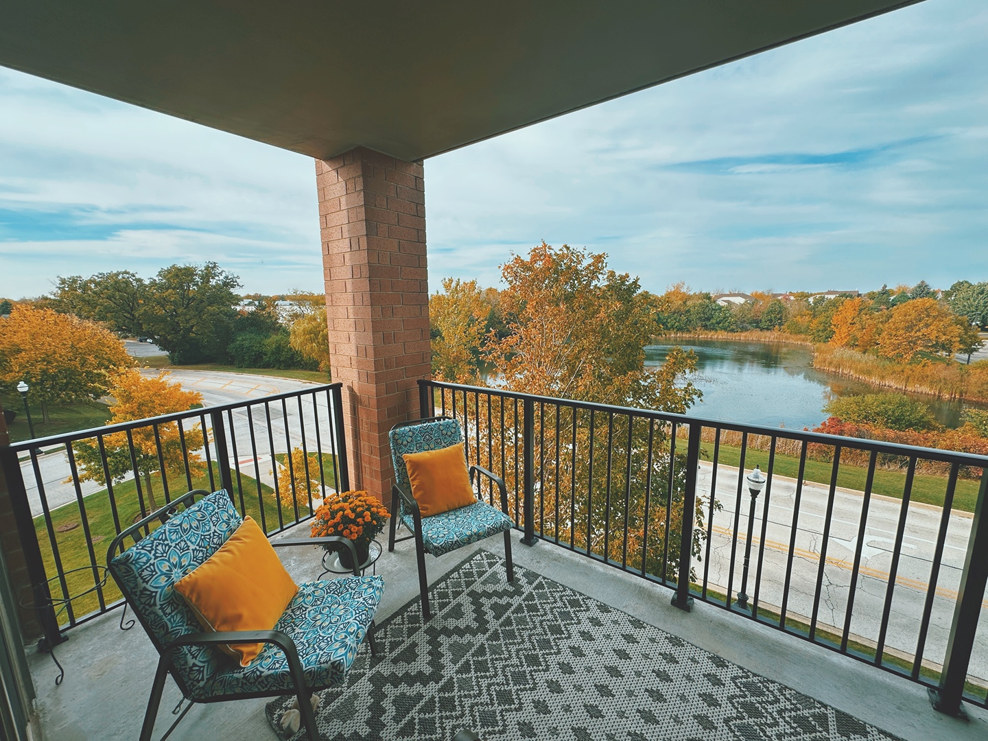 1199 East Port Clinton Road, Unit 304 Vernon Hills, IL 60061 - Photo 16 of 29 a balcony with chairs and a table