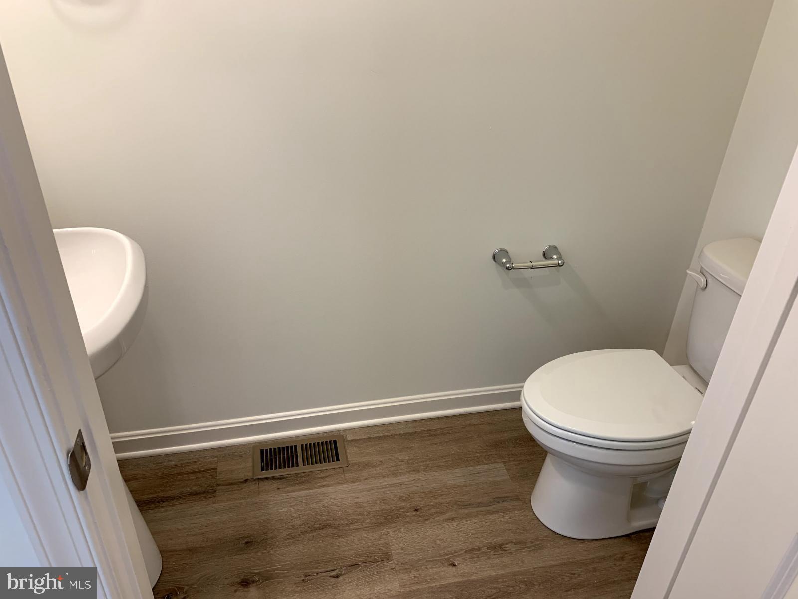 263 Trails Way Joppa, MD 21085 - Photo 6 of 27 a bathroom with a toilet and a sink