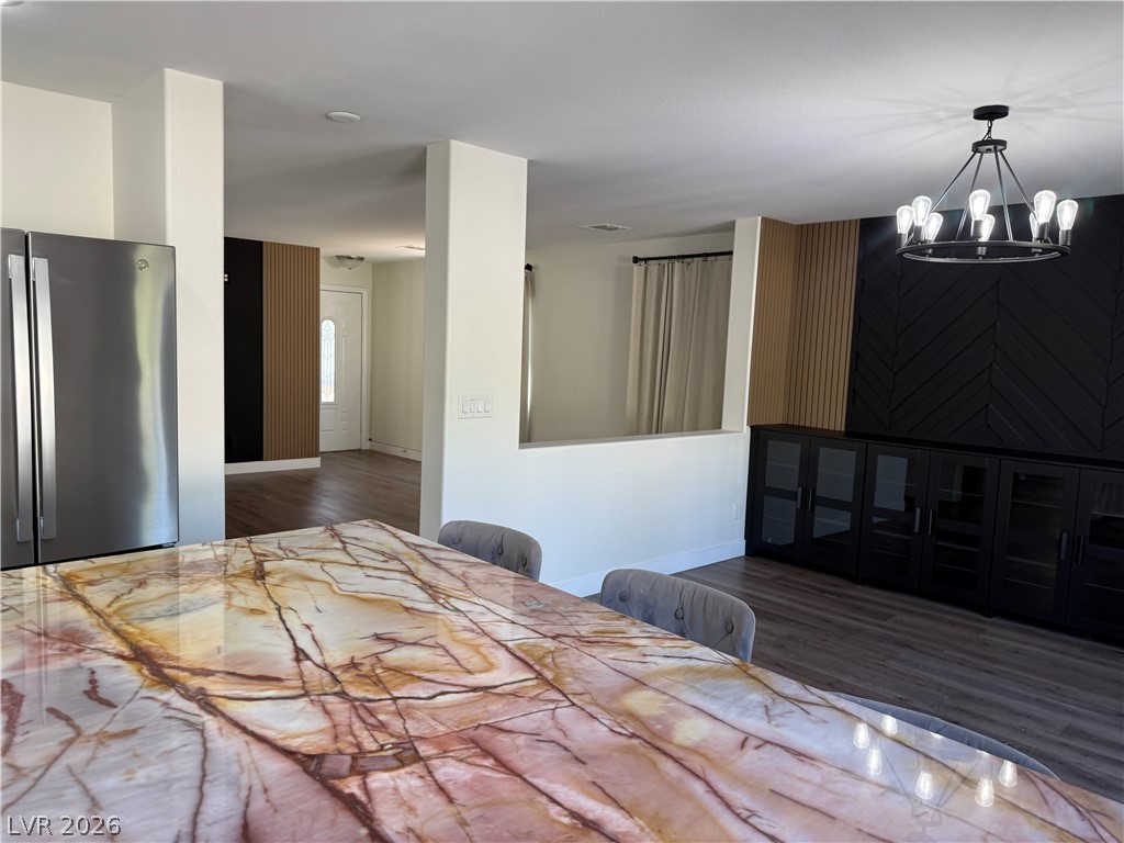 1141 Cathedral Ridge Street Henderson, NV 89052 - Photo 19 of 77 This open concept living space features striking accent walls and ample room for gatherings.