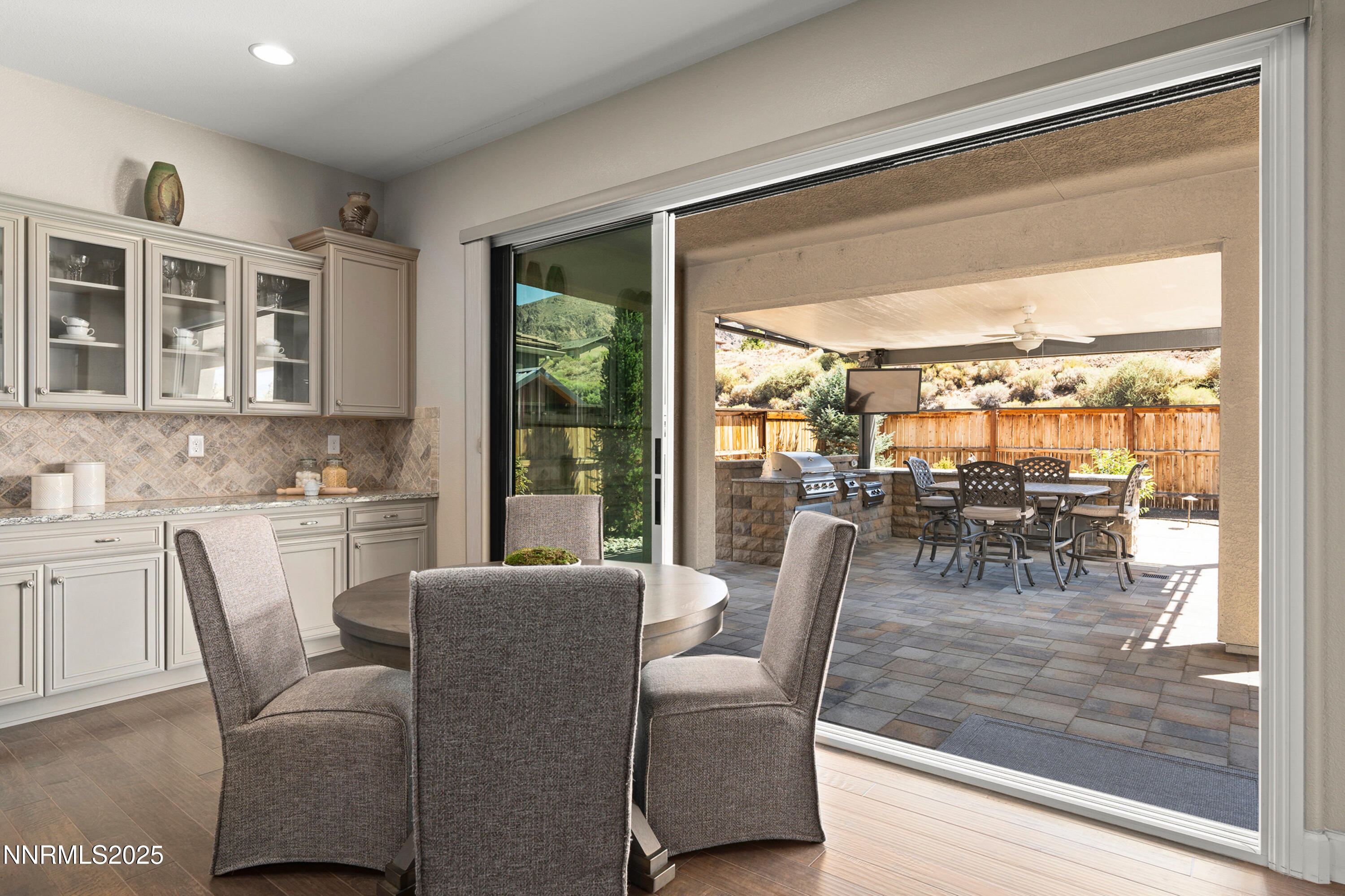 2910 Hasufel Way Reno, NV 89521 - Photo 13 of 46 a dining room with furniture water view and a floor to ceiling window
