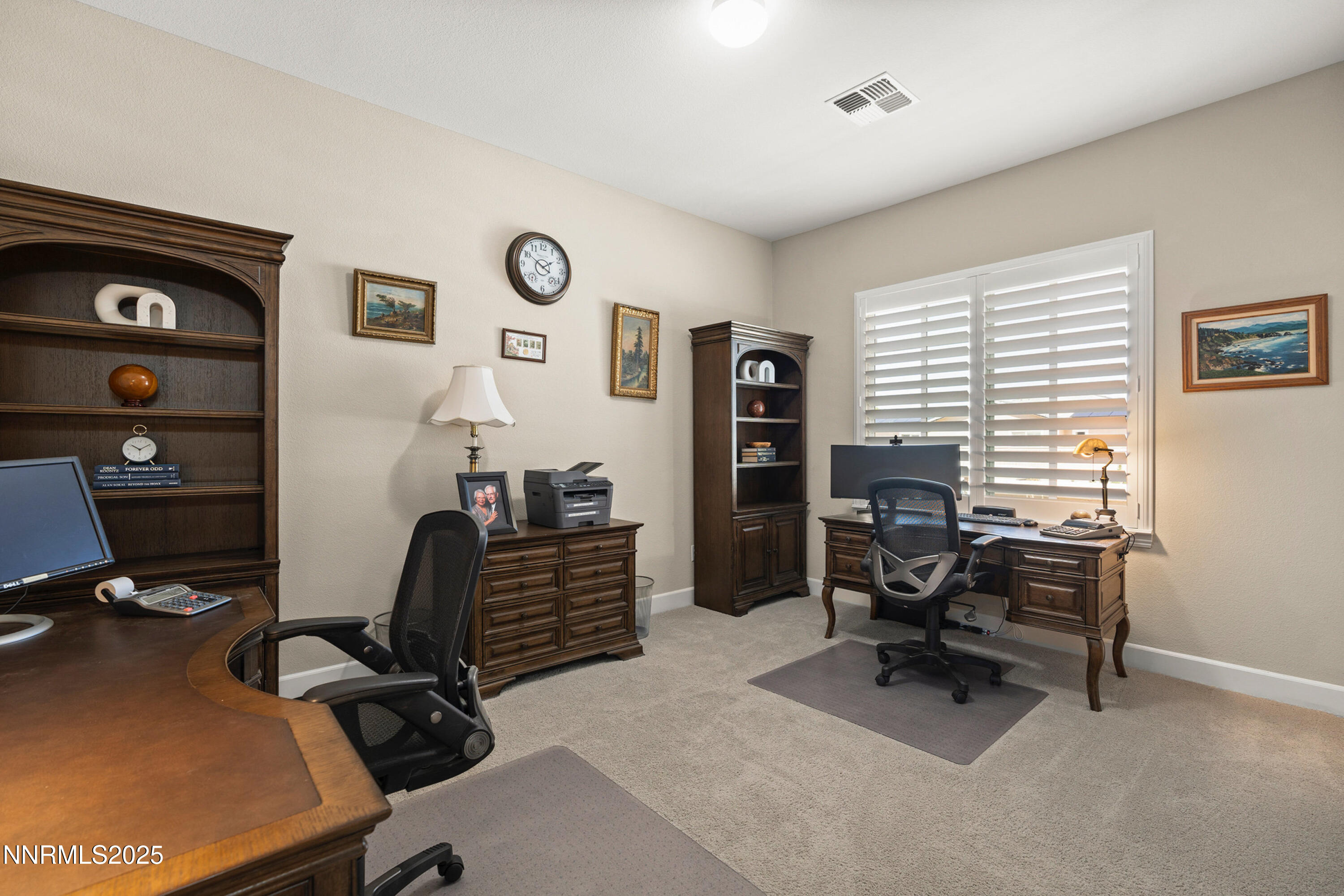 2910 Hasufel Way Reno, NV 89521 - Photo 22 of 46 a view of a workspace with furniture and a window