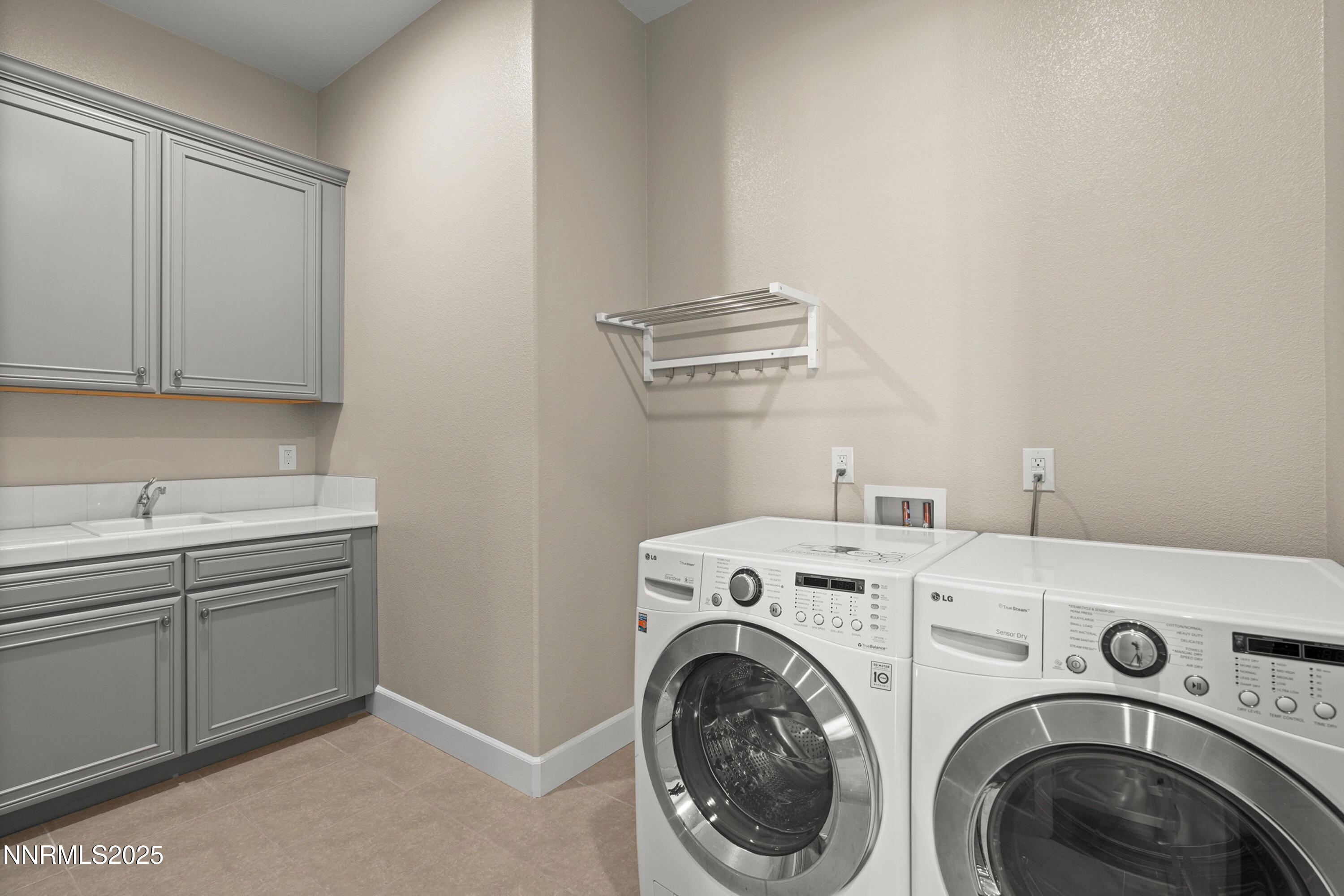 2910 Hasufel Way Reno, NV 89521 - Photo 26 of 46 a utility room with dryer and washer