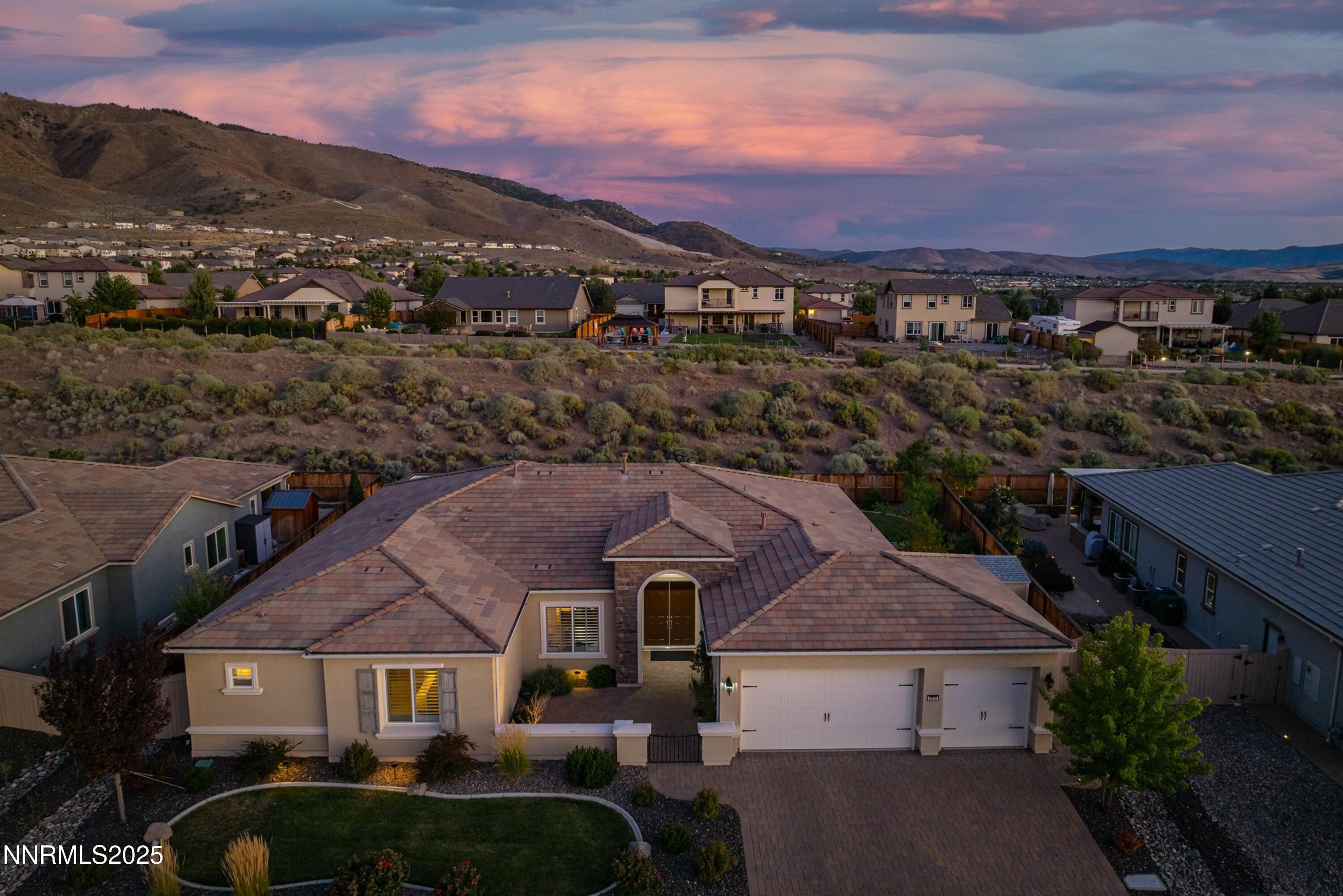 2910 Hasufel Way Reno, NV 89521 - Photo 8 of 46 a front view of a house with a yard