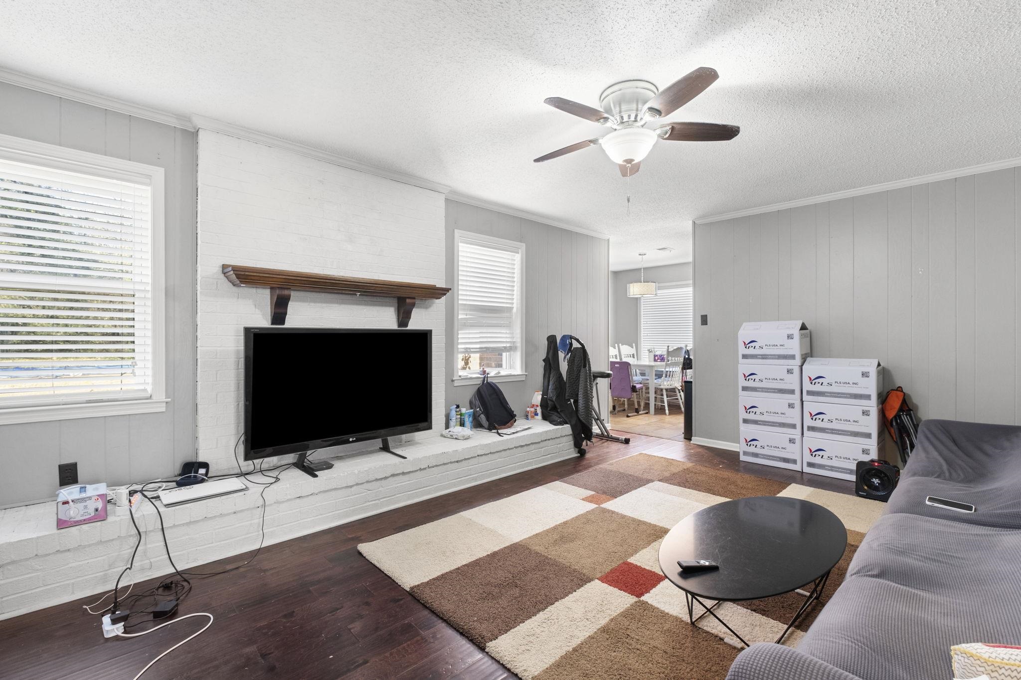 461 Dove Valley Road Collierville, TN 38017 - Photo 19 of 40 a living room with furniture and a flat screen tv