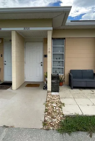 a view of front door and bedroom