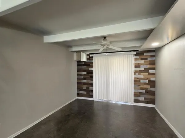 an empty room with shelves