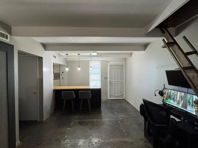 a room with furniture and window