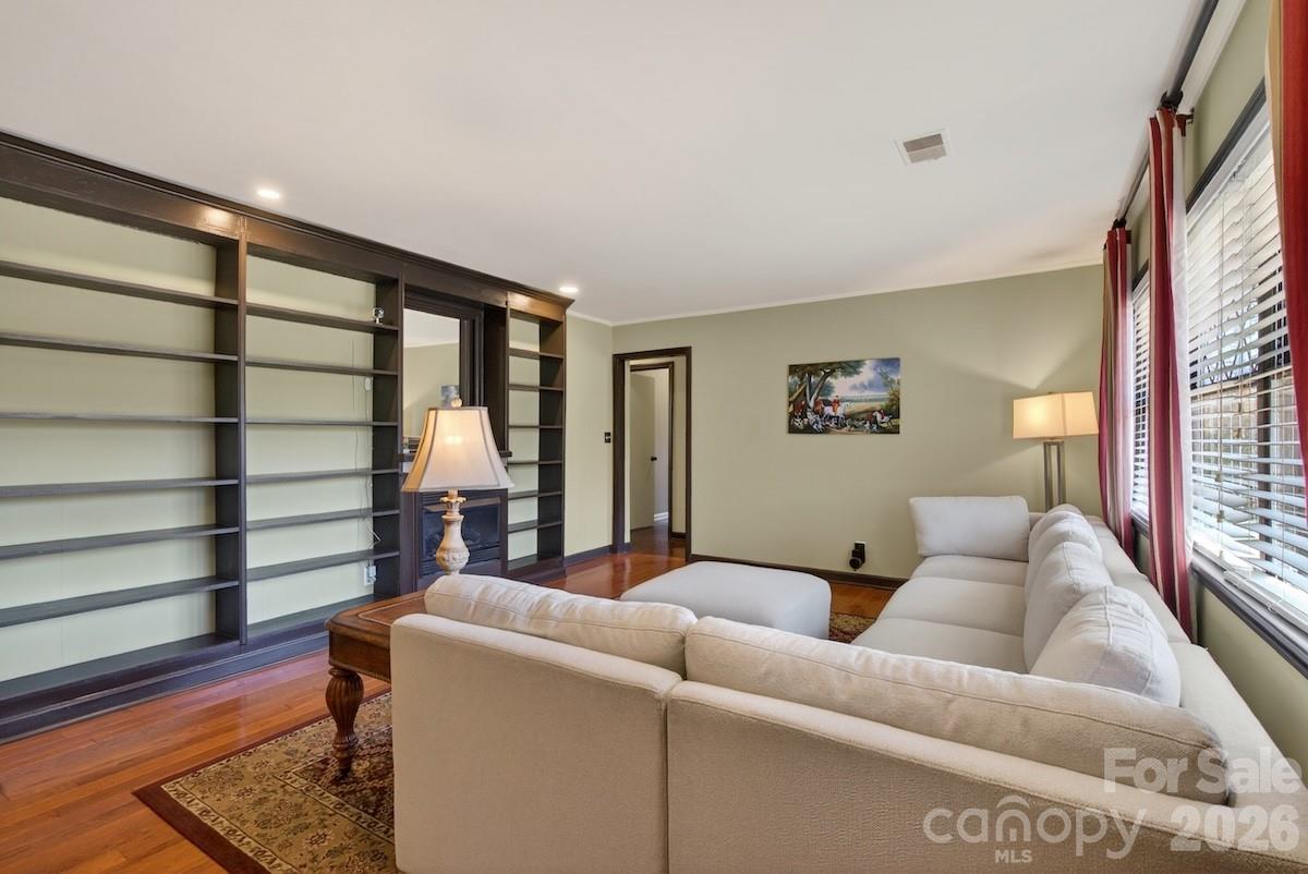 95 Whitney Avenue Tryon, NC 28782 - Photo 8 of 31 a living room with furniture and a window