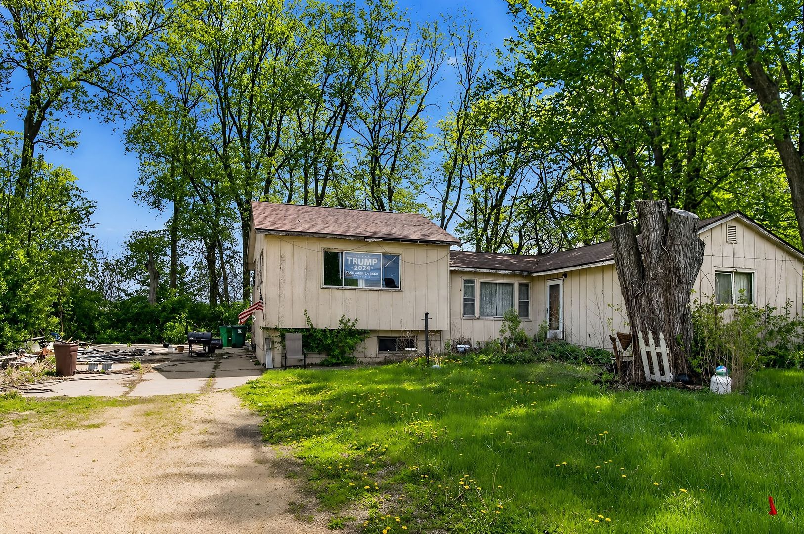 1622 Chicago Street Dixon, IL 61021 - Photo 2 of 31 a view of a house with pool and a garden