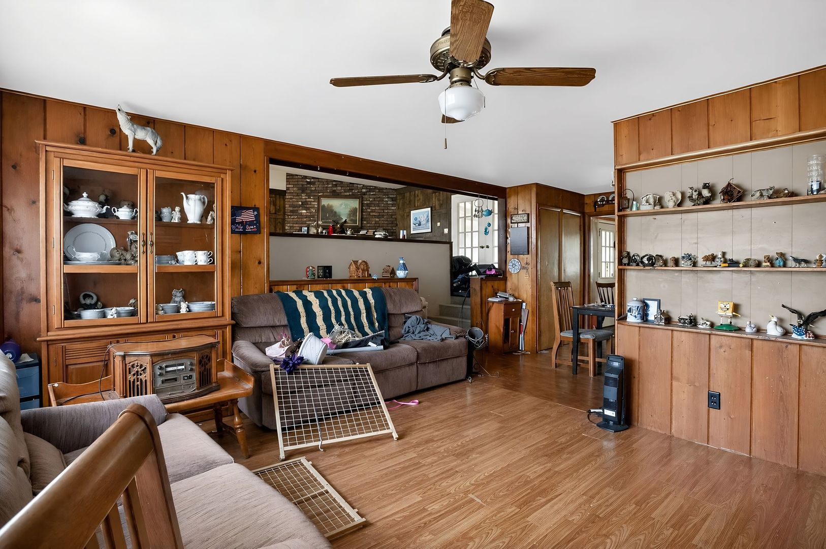 1622 Chicago Street Dixon, IL 61021 - Photo 5 of 31 a living room with furniture a rug and a window