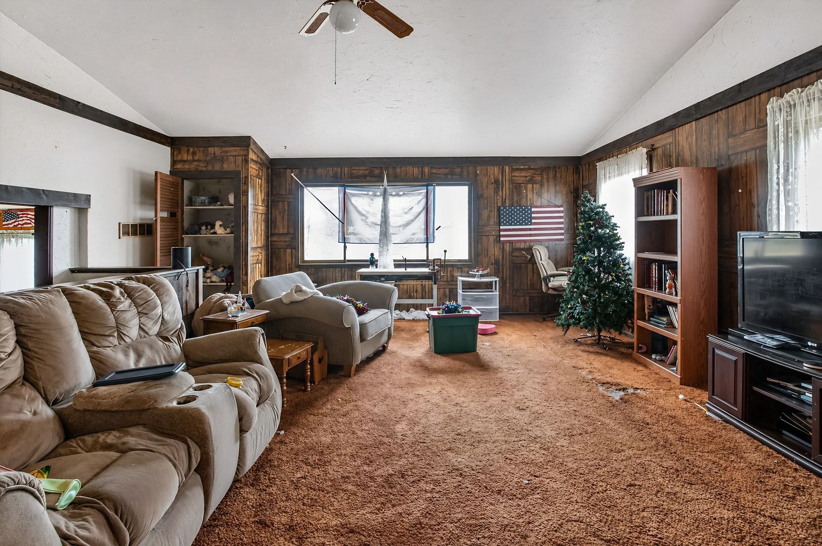 1622 Chicago Street Dixon, IL 61021 - Photo 9 of 31 a living room with furniture tv and a window