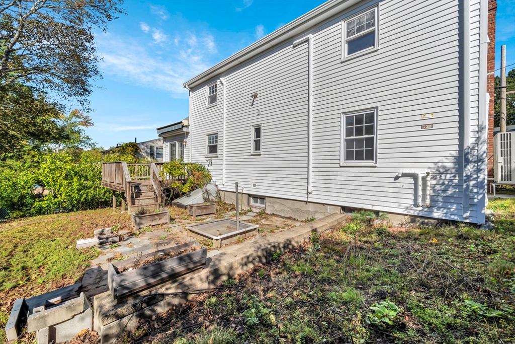 16 Wilbur Avenue Arlington, MA 02476 - Photo 4 of 5 a view of a house with a yard