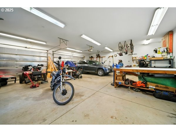 84634 Winesap Road Milton Freewater, OR 97862 - Photo 34 of 46 a view of parking garage with cars and bicycles