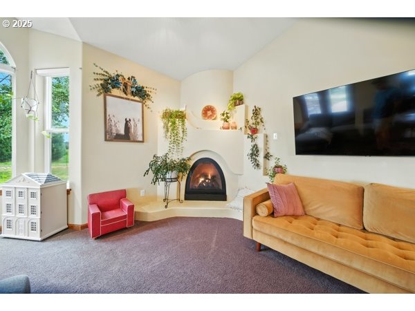 84634 Winesap Road Milton Freewater, OR 97862 - Photo 6 of 46 a living room with furniture and a flat screen tv