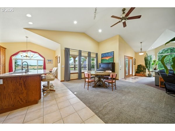 84634 Winesap Road Milton Freewater, OR 97862 - Photo 9 of 46 a living room with furniture and a flat screen tv
