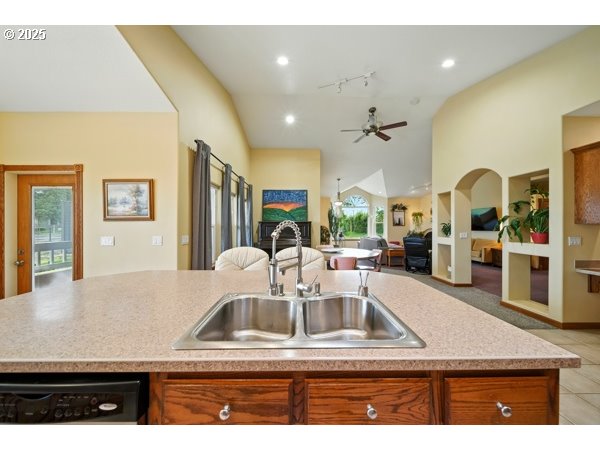 84634 Winesap Road Milton Freewater, OR 97862 - Photo 10 of 46 a kitchen with stainless steel appliances granite countertop a sink a oven and a refrigerator