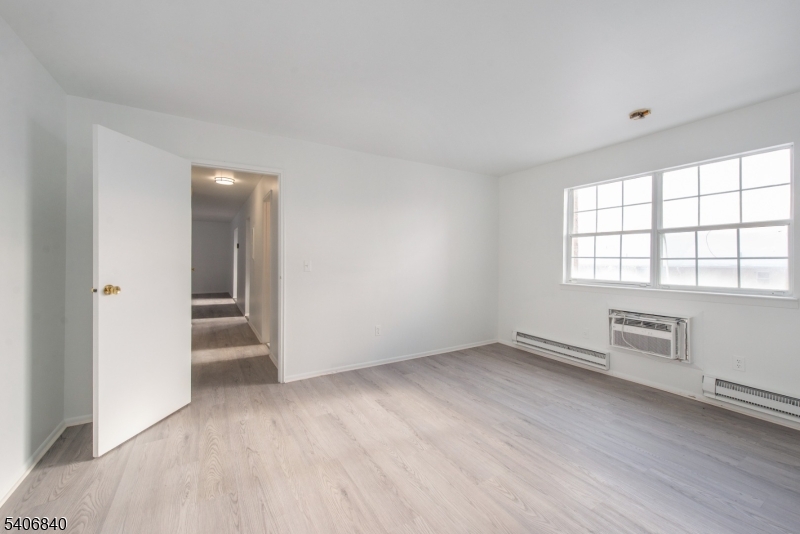 322 Richard Mine Road, Unit F5 Wharton, NJ 07885 - Photo 13 of 22 an empty room with windows