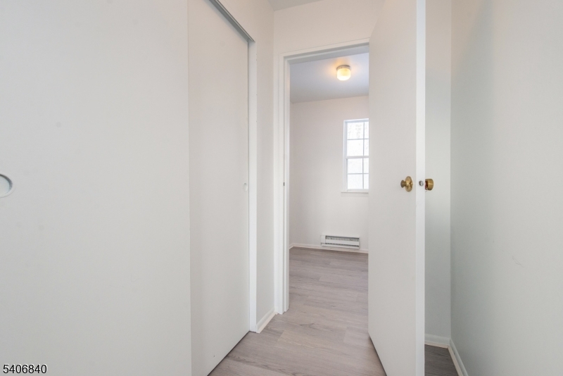 322 Richard Mine Road, Unit F5 Wharton, NJ 07885 - Photo 14 of 22 a view of a bathroom from a hallway