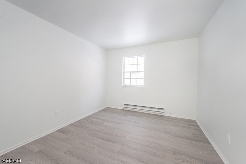 322 Richard Mine Road, Unit F5 Wharton, NJ 07885 - Photo 18 of 22 an empty room with windows