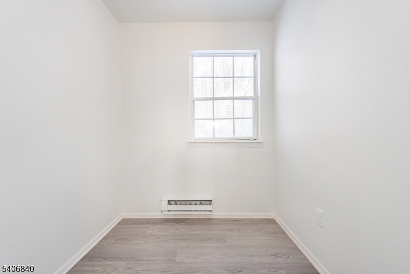 322 Richard Mine Road, Unit F5 Wharton, NJ 07885 - Photo 19 of 22 an empty room with a window