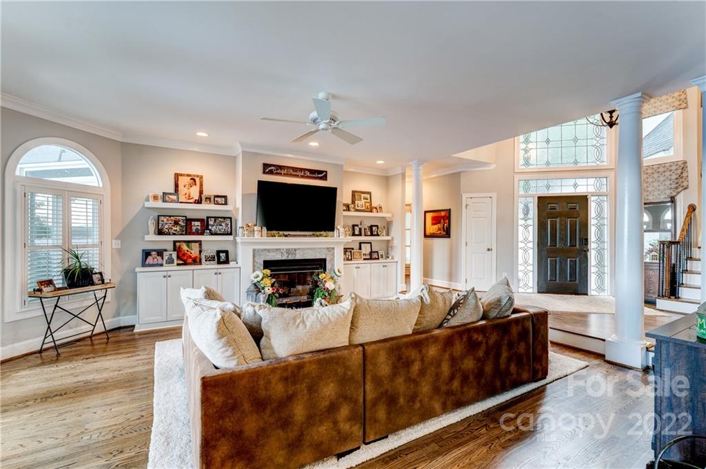 4027 Windward Drive Tega Cay, SC 29708 - Photo 11 of 44 a living room with furniture and a flat screen tv