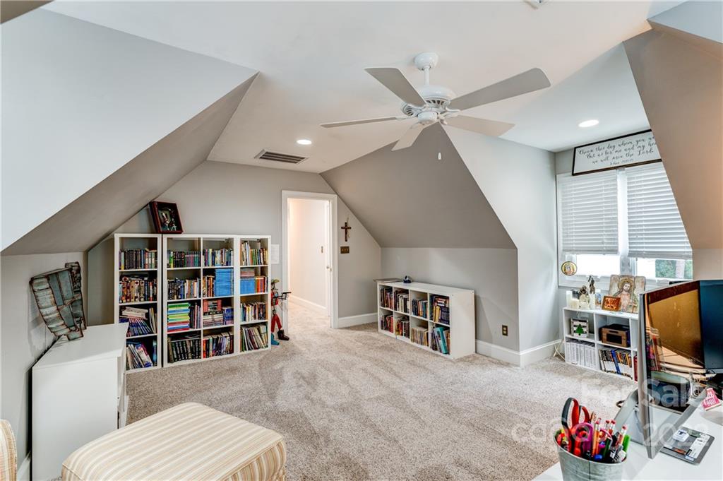 4027 Windward Drive Tega Cay, SC 29708 - Photo 33 of 44 a view of a livingroom with furniture and workspace