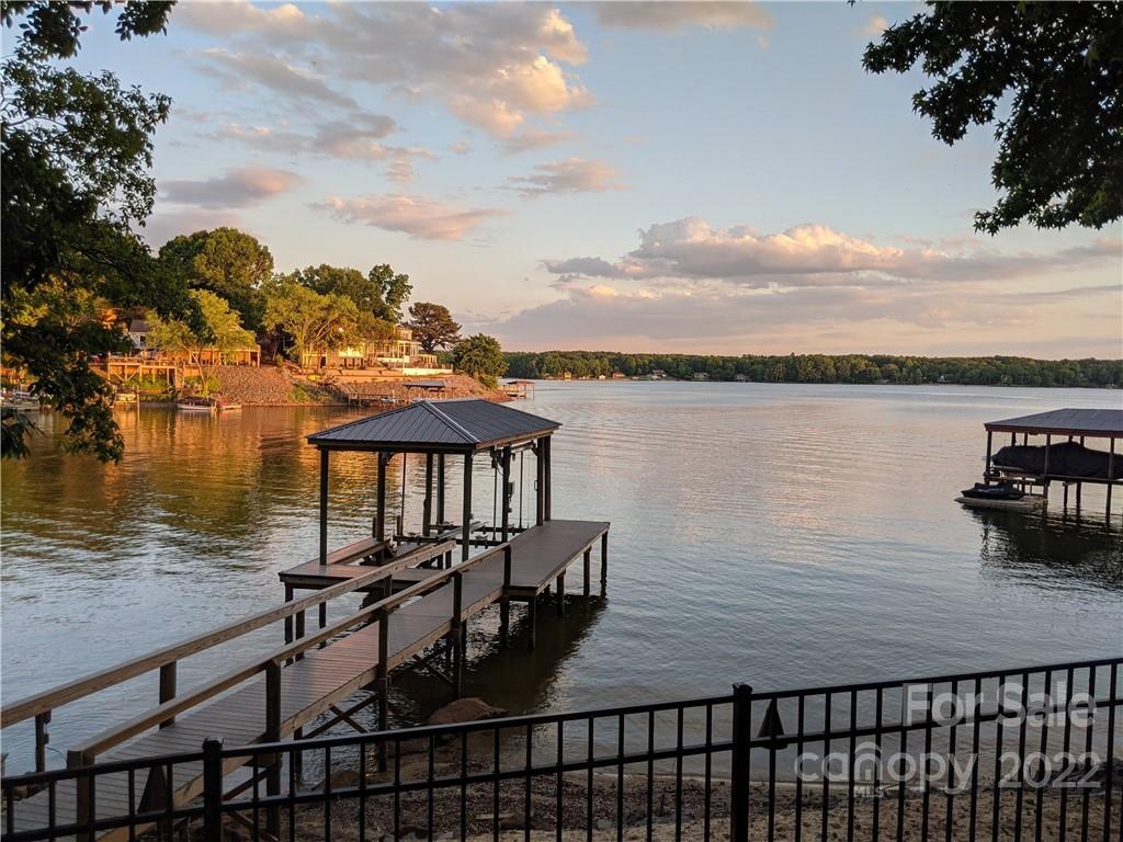 4027 Windward Drive Tega Cay, SC 29708 - Photo 41 of 44 a view of a lake from a balcony