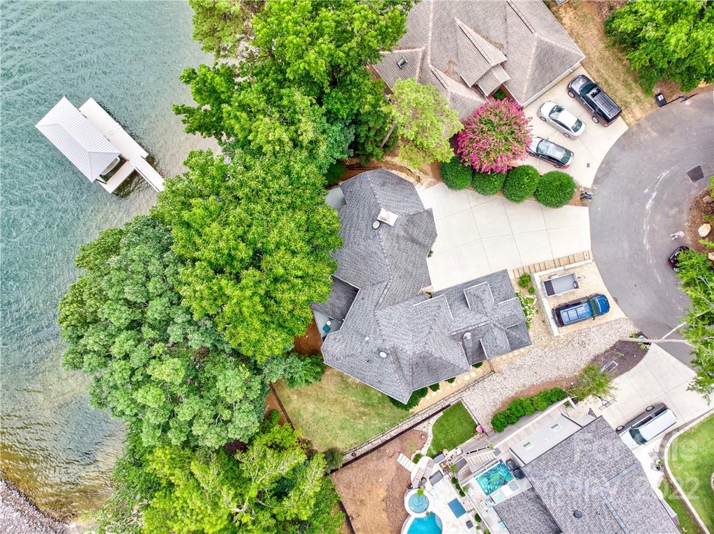 4027 Windward Drive Tega Cay, SC 29708 - Photo 6 of 44 an aerial view of a house with a yard and a wooden fence