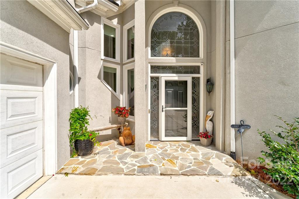 4027 Windward Drive Tega Cay, SC 29708 - Photo 8 of 44 a house view with a outdoor space