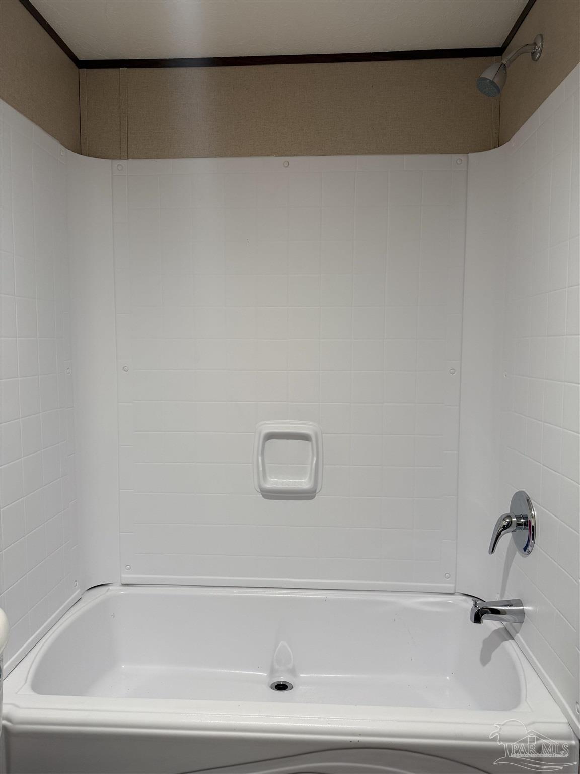 4468 Custer Lane Jay, FL 32565 - Photo 14 of 16 a bathroom with a bathtub