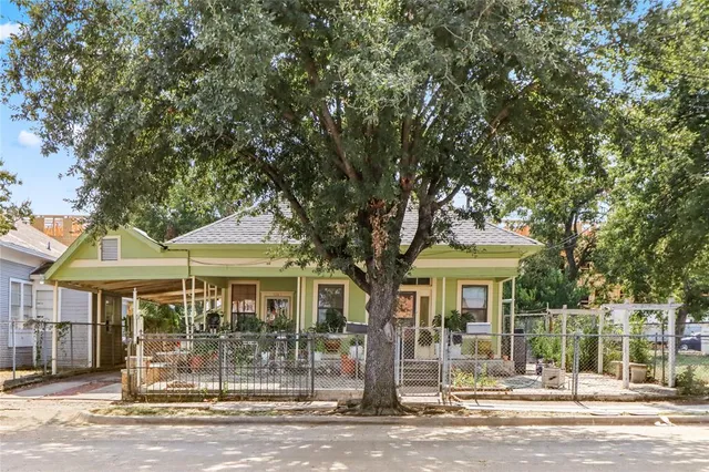 a front view of a house with a porch
