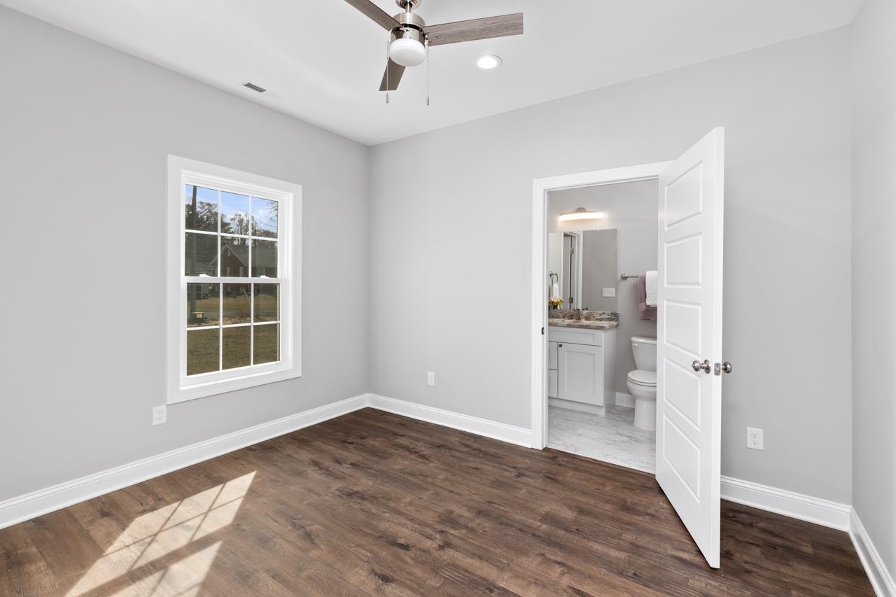 1013 B Street Waynesboro, VA 22980 - Photo 11 of 27 a view of empty room with wooden floor and fan