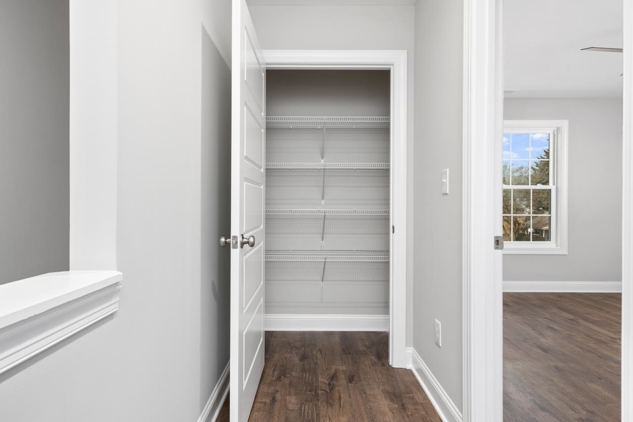 1013 B Street Waynesboro, VA 22980 - Photo 26 of 27 a view of a walk in closet with wooden floor