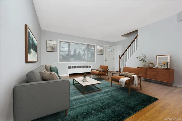 a living room with furniture and a couch