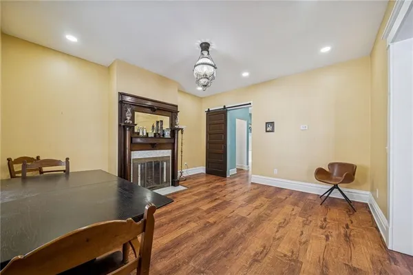 a living room with furniture and a table