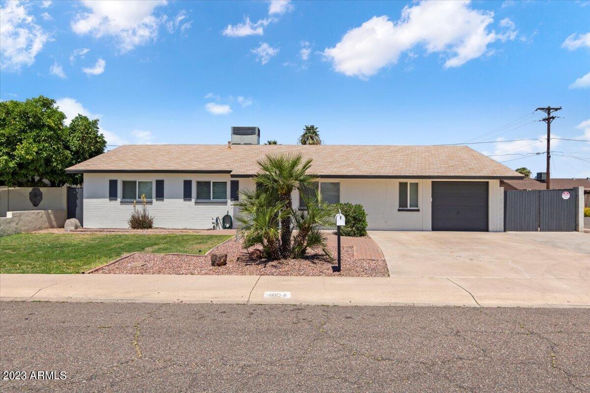4104 West Griswold Road Phoenix, AZ 85051 - Photo 1 of 25 01-Front of Home