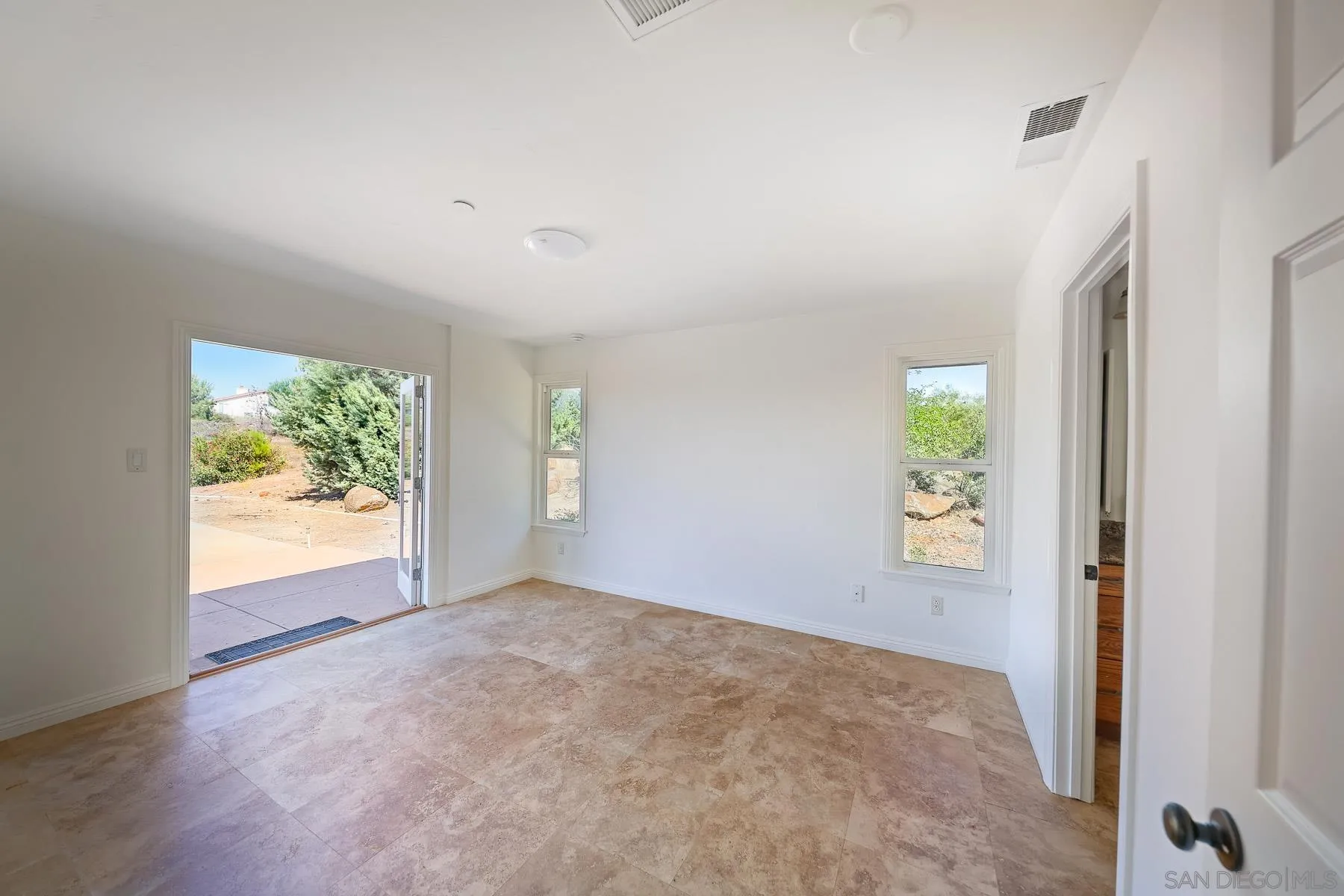 38960-62 Magee Road Pala, CA 92059 - Photo 12 of 25 an empty room with windows