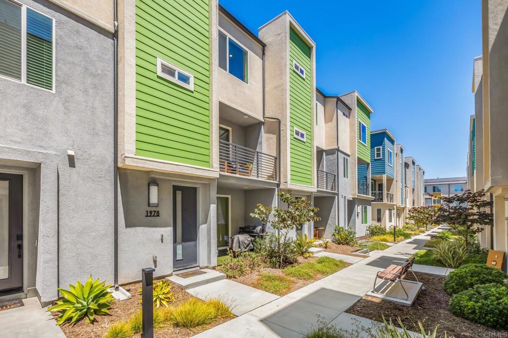 a view of a patio with swimming pool table and chairs
