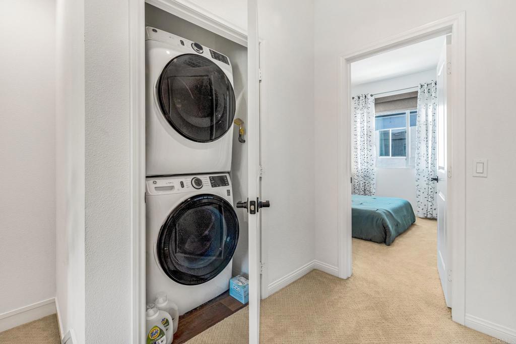 1978 Affinity Lane Chula Vista, CA 91915 - Photo 20 of 26 a utility room with dryer and washer
