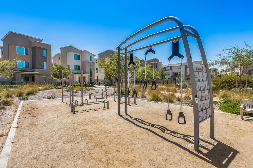 1978 Affinity Lane Chula Vista, CA 91915 - Photo 24 of 26 a view of a building with a bench in patio