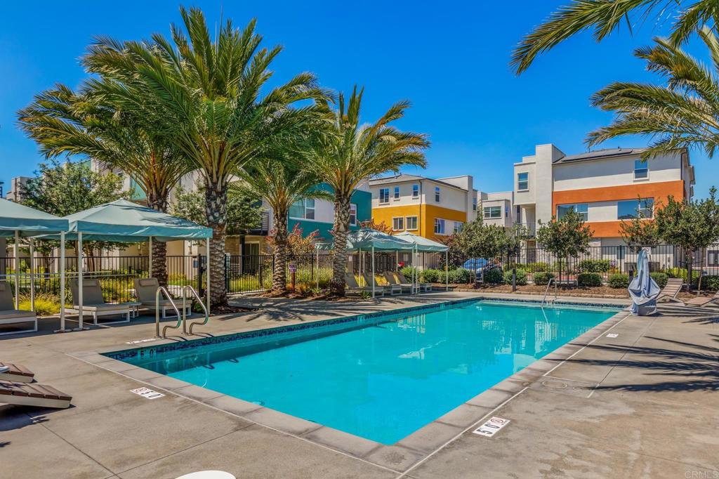 1978 Affinity Lane Chula Vista, CA 91915 - Photo 26 of 26 a view of a swimming pool with a patio and a yard