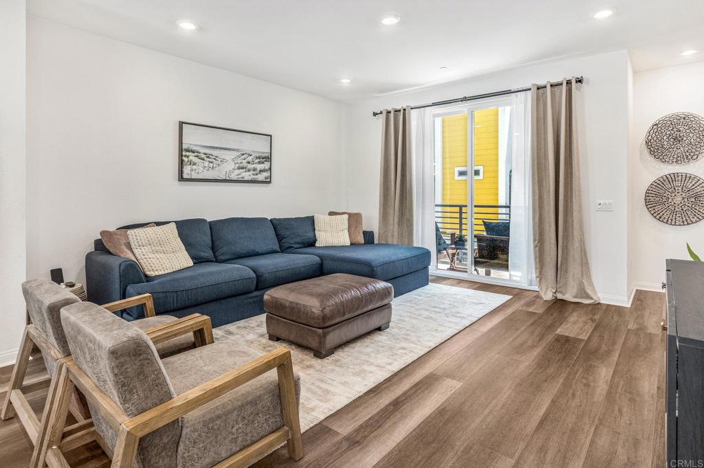 1978 Affinity Lane Chula Vista, CA 91915 - Photo 3 of 26 a living room with furniture and a large window